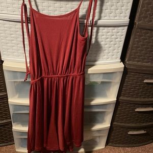 Beautiful backless red dress , with the tags still on and never worn!